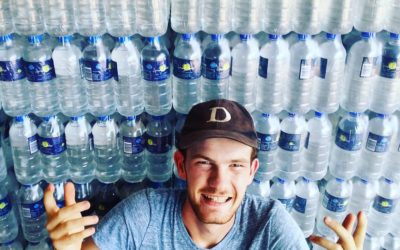 Wall of water bottles donated by Fresh water church